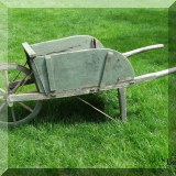 L07. Antique wheelbarrow. 24” x 69”